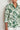 Close-up front view of the Serenade Top in Garden Paisley green print, showcasing the classic shirt collar, delicate lace trim along the placket and cuffs, and 3/4 sleeves crafted in 100% linen.