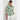 Full front view of a model wearing the Serenade Top in Garden Paisley green floral print, featuring a shirt collar, lace trim details, and 3/4 sleeves.