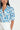 Sienne Top medium shot focusing on the delicate illustrative Song Bird floral pattern, raglan sleeve gathers at the sleeve head, and button-through V-neckline.
