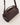 Small Bolster Bag open top view showing secure zip closure, herringbone cotton lining, and internal slip pocket in mahogany waxy leather.