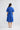 Soiree Dress in Cobalt shown from the back, featuring a back waist tie and crafted from a lyocell linen blend.