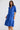 Soiree Dress in Cobalt featuring a V-shape neck drop with gathered details and raglan sleeves.