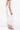 Surge Pant Alabaster shown from the side profile highlighting the comfortable fit and cropped length.