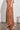 Surge Pant Truffle featuring a cropped wide-leg silhouette in cotton lace shown from the side.