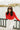 The Bella in black/tan styled on a model wearing oversized retro frames for everyday wear.