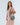 Elms and King Windsor crossbody bag in Sage pale green. Modern soft quilted canvas side bag with a matching wide strap, showcased on a model at premium homewares and fashion boutique The White Place.