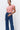 Women's Kireina Freya wide-leg jean in Ribbed Mid Blue. Premium high-waisted denim available online and in-store at The White Place Australia.