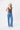 Women's Kireina Harper Jean in Ribbed Mid Blue. Full length wide-leg silhouette available in sizes 24 to 32 at The White Place.