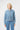 Kireina Mila denim jacket in 70s Blue fully buttoned up. Smart casual trans-seasonal jacket option in a light blue hue, stocked across Australia by boutique specialist The White Place.