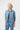 Kireina Mila denim jacket in 70s Blue worn open over a basic tee. Boxy cropped jean jacket styling with button-down front, available from Australian fashion stockist The White Place.