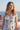 Victoria Sicily Maxi Dress crafted from 100% hemp featuring an elegant Mediterranean-inspired print shown in a close up view.