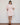 Virginia Mini Dress Baby Pink shown in a full length view with a relaxed mini length silhouette.