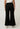 Willow Linen Embroidery Pant Black back view showcasing the elasticated back waistband and wide-leg fit.
